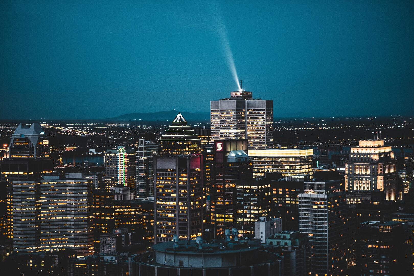 Background picture of the Montreal skyline at night
